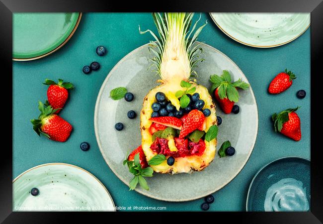 Fruit salad in half a pineapple. Framed Print by Mykola Lunov Mykola