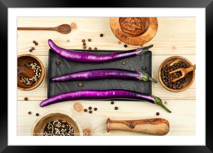 Small raw purple eggplants Framed Mounted Print by Mykola Lunov Mykola