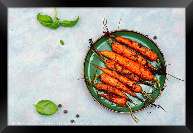 Appetizing baked carrots, copy space Framed Print by Mykola Lunov Mykola