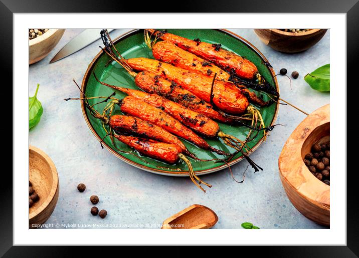 Healthy homemade roasted carrots Framed Mounted Print by Mykola Lunov Mykola