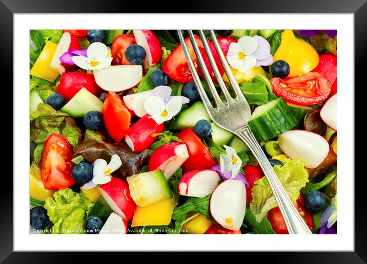 Tasty light salad with edible flowers Framed Mounted Print by Mykola Lunov Mykola