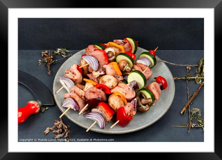 Raw meat in marinade. Framed Mounted Print by Mykola Lunov Mykola
