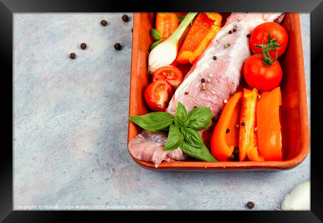 Raw pork tenderloin in a baking dish. Framed Print by Mykola Lunov Mykola