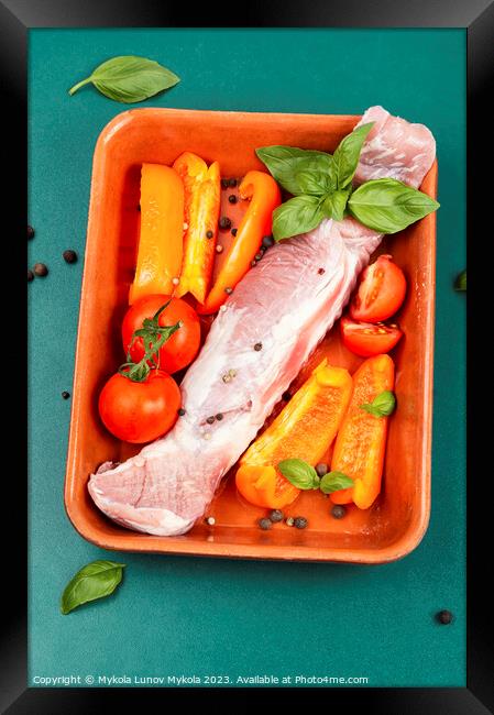 Raw fresh meat tenderloin in a baking dish. Framed Print by Mykola Lunov Mykola