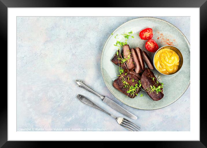 Fried tasty ostrich steaks, space for text Framed Mounted Print by Mykola Lunov Mykola