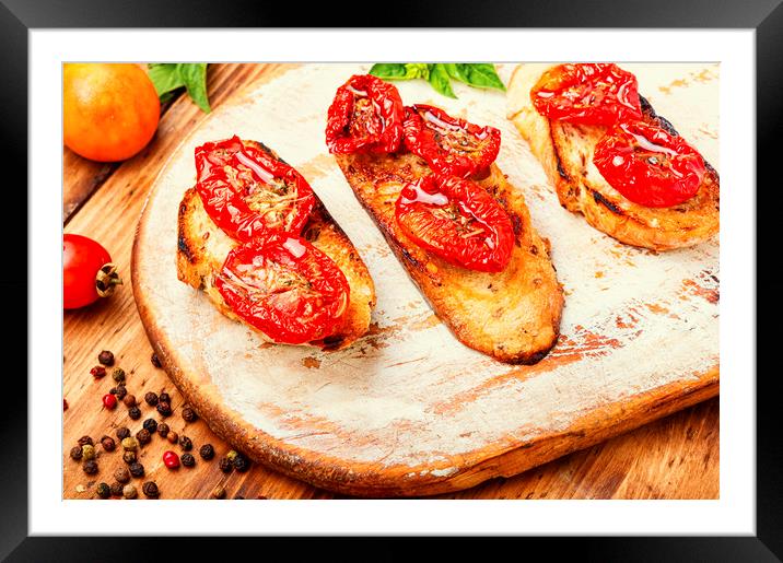 Bruschetta with sun dried tomatoes Framed Mounted Print by Mykola Lunov Mykola