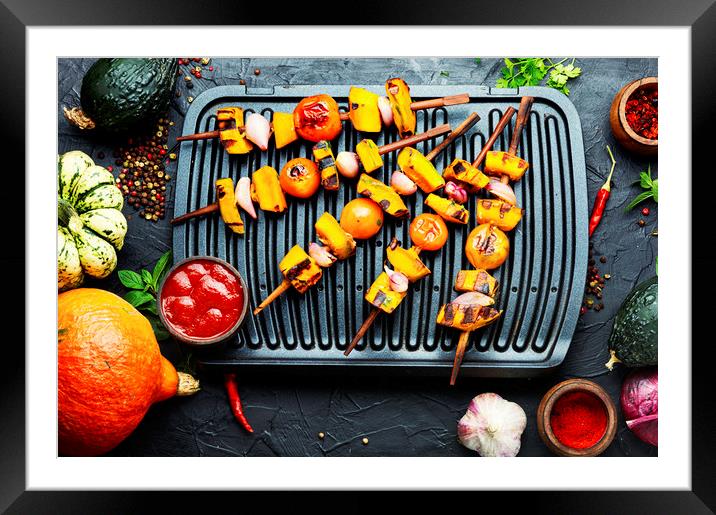 Grilled pumpkin on a skewer Framed Mounted Print by Mykola Lunov Mykola