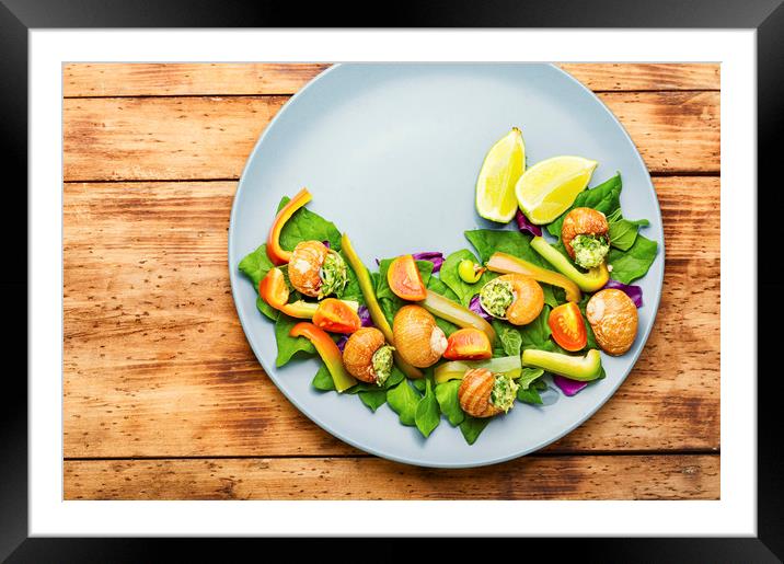 Salad with vegetables and snails Framed Mounted Print by Mykola Lunov Mykola