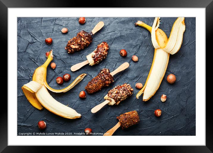 Banana in chocolate Framed Mounted Print by Mykola Lunov Mykola
