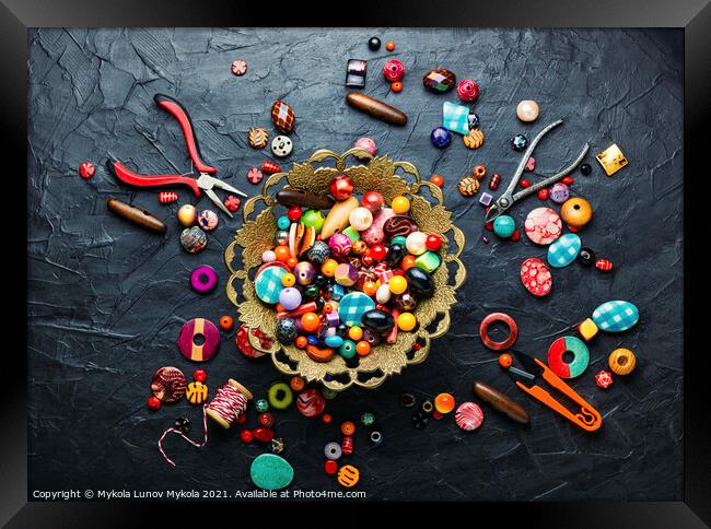 Set of multicolored beads Framed Print by Mykola Lunov Mykola