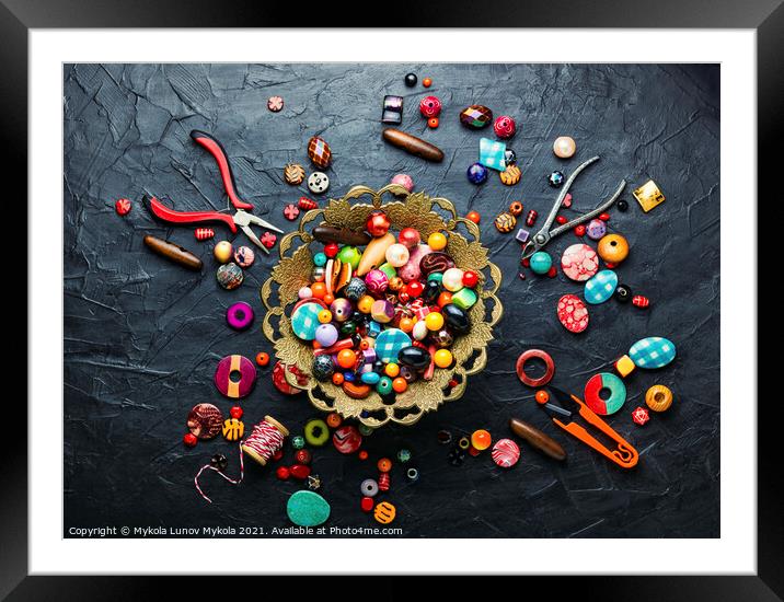 Set of multicolored beads Framed Mounted Print by Mykola Lunov Mykola