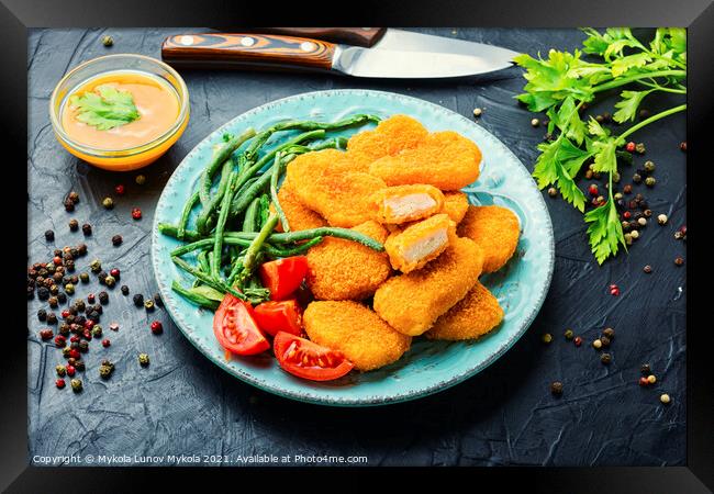 Nuggets with vegetables Framed Print by Mykola Lunov Mykola