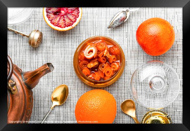 Orange fruit jam in stylish glass jar,top view Framed Print by Mykola Lunov Mykola