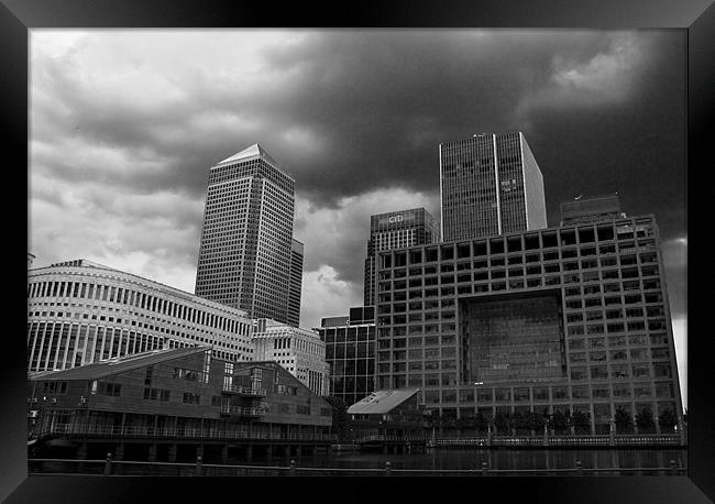 Stormy clouds over Canary Wharf Framed Print by David French