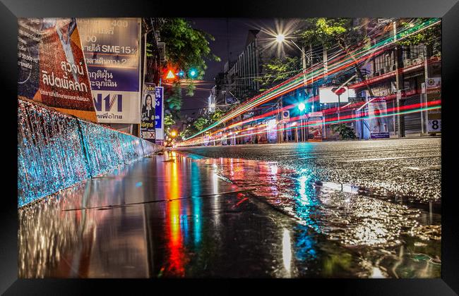 Rainy Night a few days before election in Bangkok Framed Print by peter kellfur