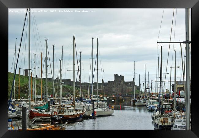 Peel Castle and boats, Isle of Man Framed Print by Laurence Tobin
