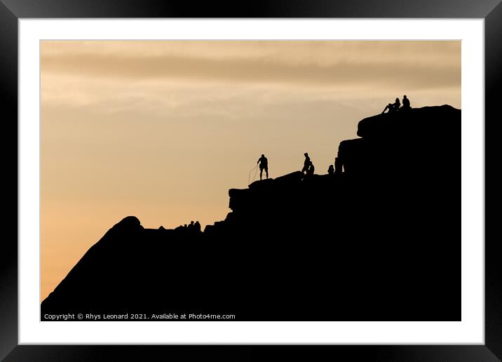 Striking sunset scene of stanage edge rock formations. People on top Framed Mounted Print by Rhys Leonard