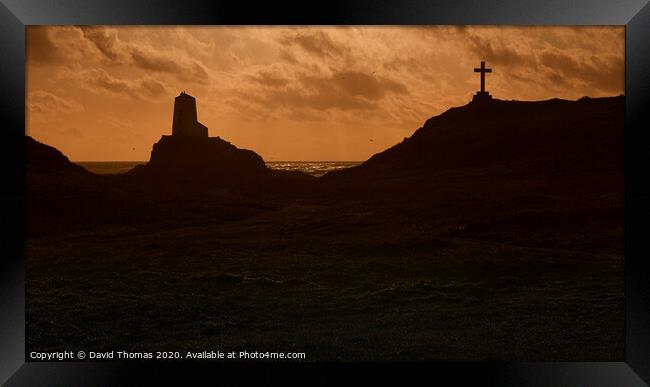 Majestic Tyr Mawr Lighthouse at Sunset Framed Print by David Thomas