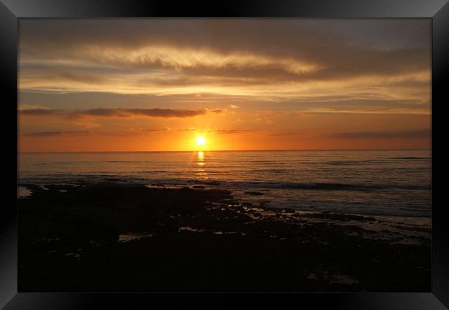 Pacific Sunset  Framed Print by Tim Duck