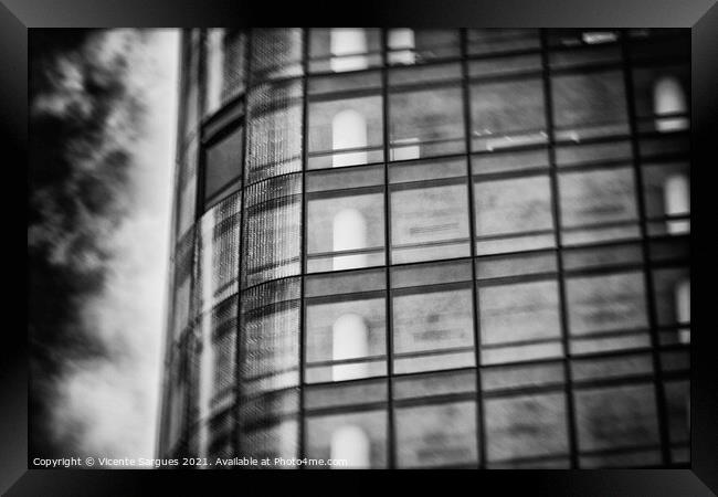 Windows in a business building Framed Print by Vicente Sargues