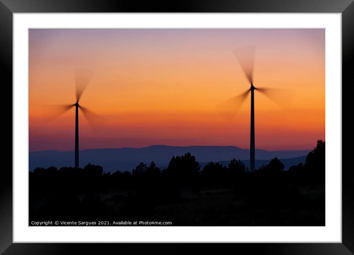 Two windmills in motion at sunset Framed Mounted Print by Vicente Sargues