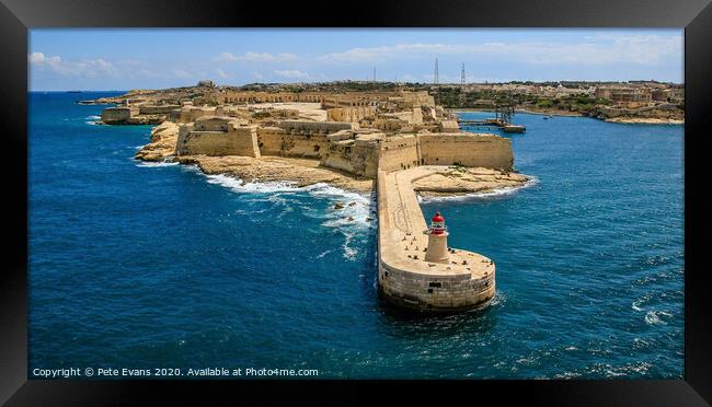 Lighthouse at Valletta Framed Print by Pete Evans