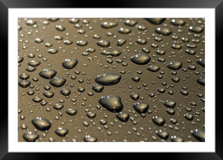 Rain drops at reflective surface, selective focus Framed Mounted Print by Arpad Radoczy