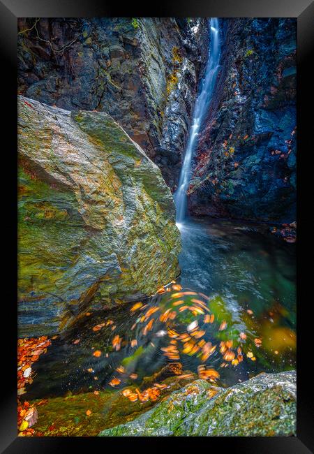 Beautiful veil waterfalls, mossy rocks, rotating leaves Framed Print by Arpad Radoczy