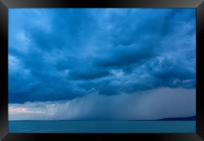 Big powerful storm clouds over the Lake Balaton of Hungary Framed Print by Arpad Radoczy