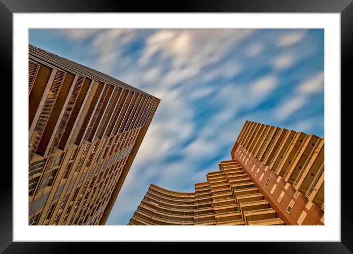 Skyscreaper with long exposure clouds  Framed Mounted Print by Arpad Radoczy
