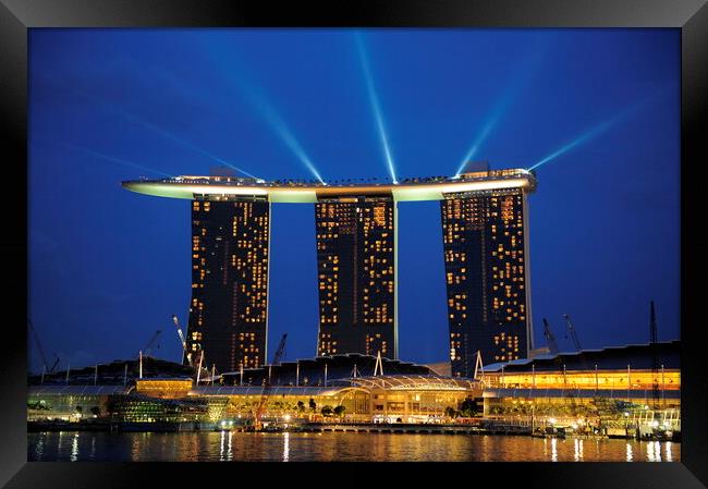 A lit up city at night with Marina Bay Sands Singapore in the background Framed Print by Alessandro Della Torre