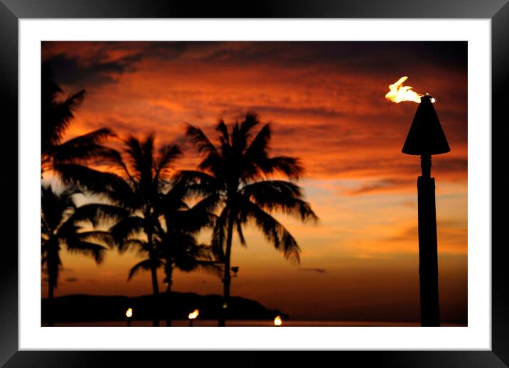 A red sunset over ocean shore in front of a palm tree Framed Mounted Print by Alessandro Della Torre