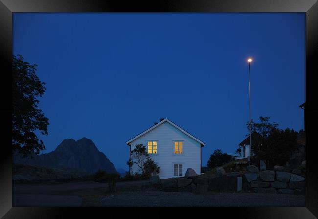 A house that in the blue hours has a sign on the side of the street Framed Print by Alessandro Della Torre