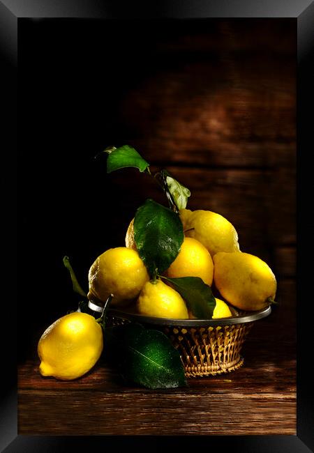 lemons on wood table Framed Print by Alessandro Della Torre