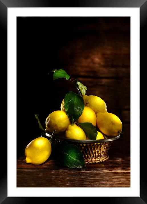 lemons on wood table Framed Mounted Print by Alessandro Della Torre