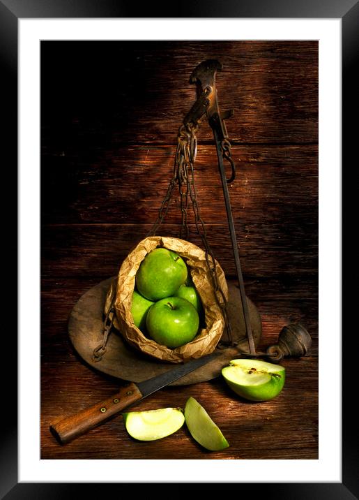 green apple on a weight scale meter Framed Mounted Print by Alessandro Della Torre