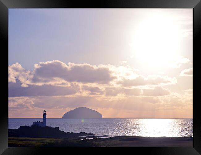 Turnberry lighthouse and Ailsa Craig as sun sets Framed Print by Allan Durward Photography