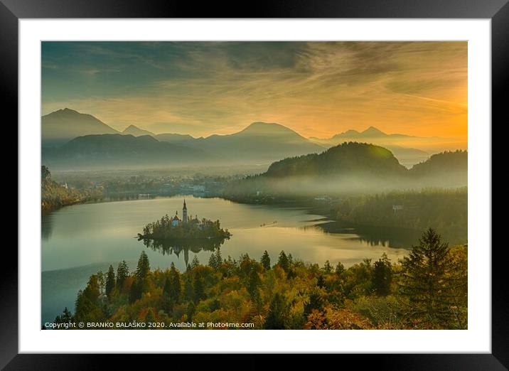 Lake with a mountain in the background Framed Mounted Print by BRANKO BALAŠKO