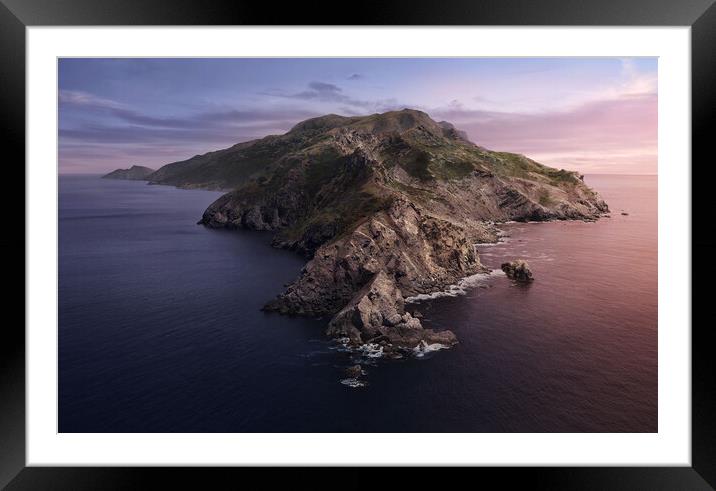 A rocky island in the middle of a body of water Framed Mounted Print by Omar Al-Ashi