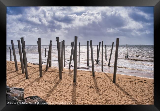 Poles on Hjerting public beach promenade in Esbjerg, Denmark Framed Print by Frank Bach