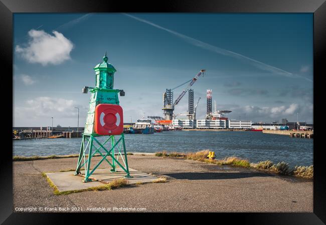 Beacon lighthouse in Esbjerg harbor, Denmark Framed Print by Frank Bach