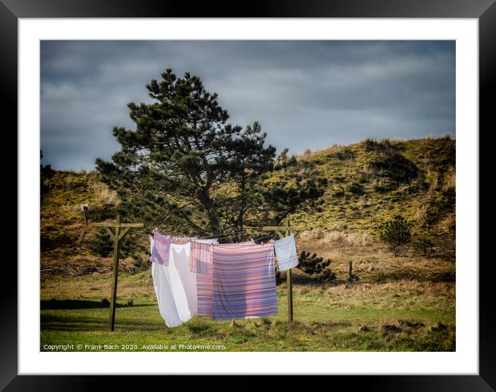 Washing hanging to dry on Mandoe island in the wadden sea, Esbjerg Denmark Framed Mounted Print by Frank Bach