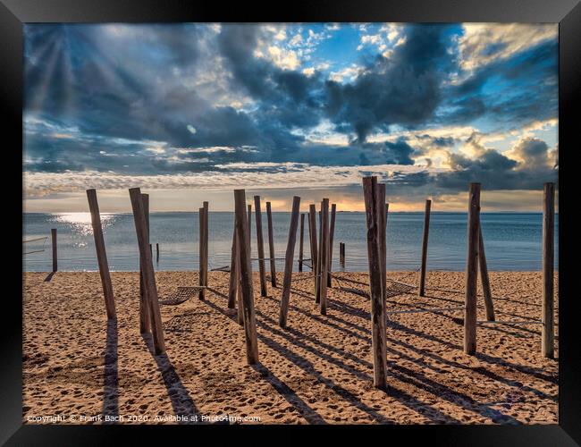 Poles on Hjerting public beach promenade in Esbjerg, Denmark Framed Print by Frank Bach