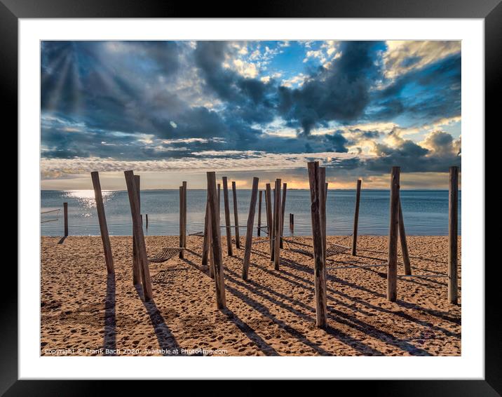 Poles on Hjerting public beach promenade in Esbjerg, Denmark Framed Mounted Print by Frank Bach