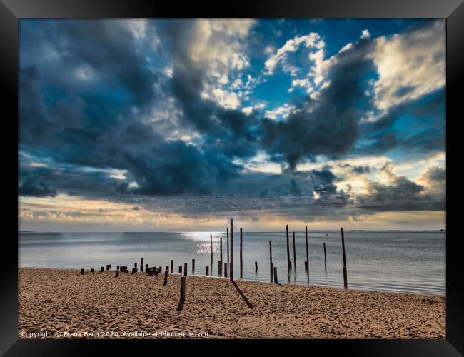 Poles on Hjerting public beach promenade in Esbjerg, Denmark Framed Print by Frank Bach