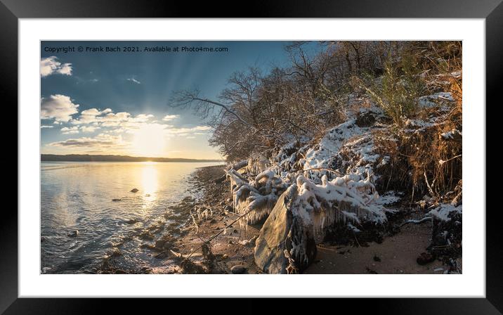 Snow and icicles at the fjord near Vejle in Dennmrk Framed Mounted Print by Frank Bach