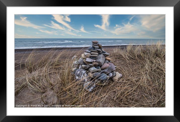 Stone cairn at Lildstrand beach in western rural Denmark Framed Mounted Print by Frank Bach