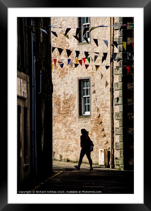 A person in Silhouette in the lane  Framed Mounted Print by Richard Ashbee