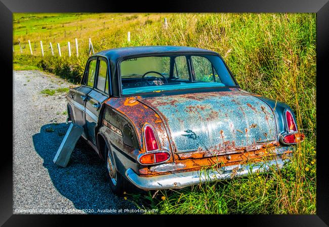 An old vintage car rusting in a Shetland farm Framed Print by Richard Ashbee