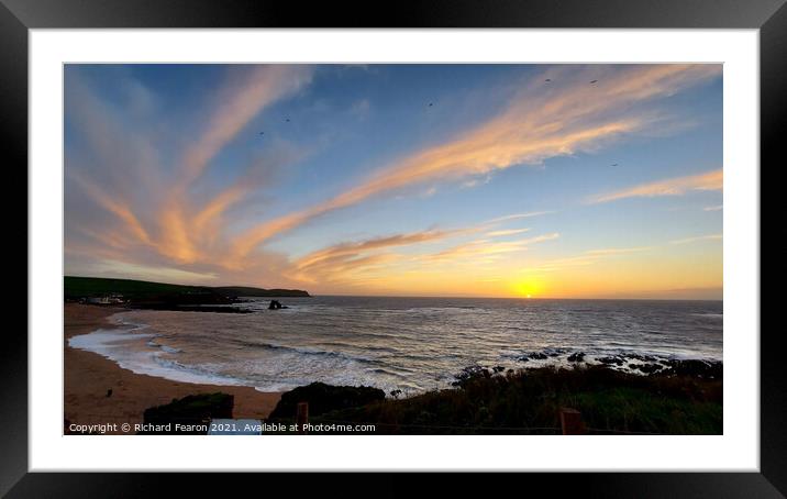 Thurlestone rock, sunset with clouds swirling in t Framed Mounted Print by Richard Fearon